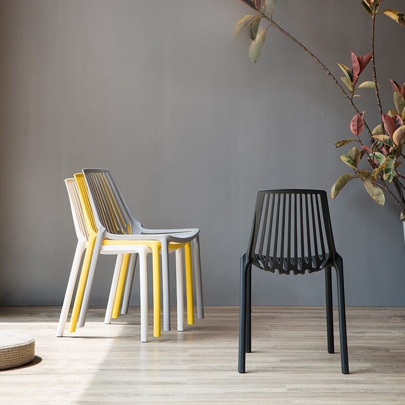 stackable black PP chairs with holes