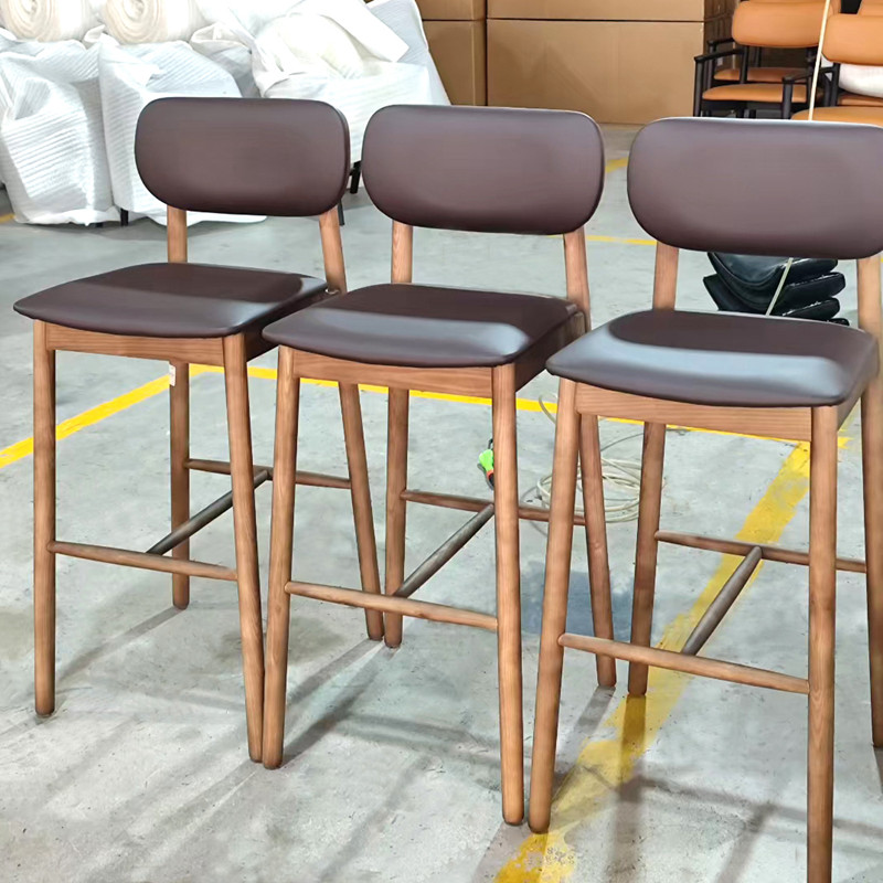 Brown leather cushioned wood bar stools with backs