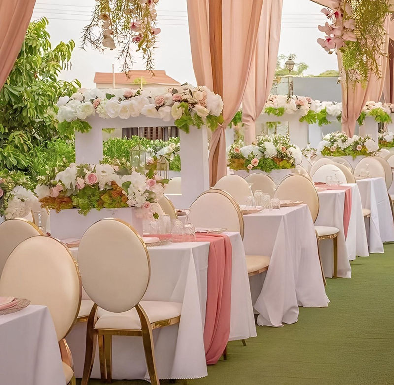 White and gold banquet chairs for wedding ceremony