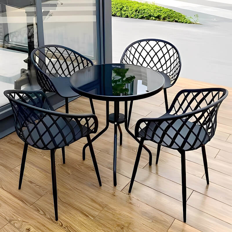 Round plastic outdoor dining chairs and table set